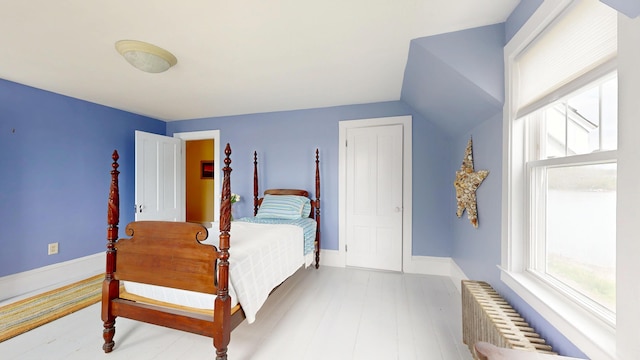 19 Spruce Head Rd, South Thomaston, ME 04858 - bedroom featuring radiator and wood finished floors