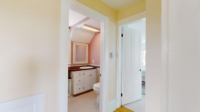 19 Spruce Head Rd, South Thomaston, ME 04858 - hall featuring a sink and lofted ceiling