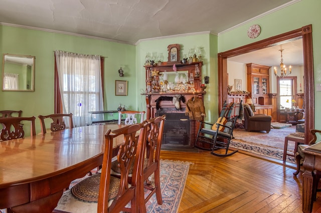 27 Pine St, Eustis, ME 04936 - dining area featuring a chandelier and ornamental molding