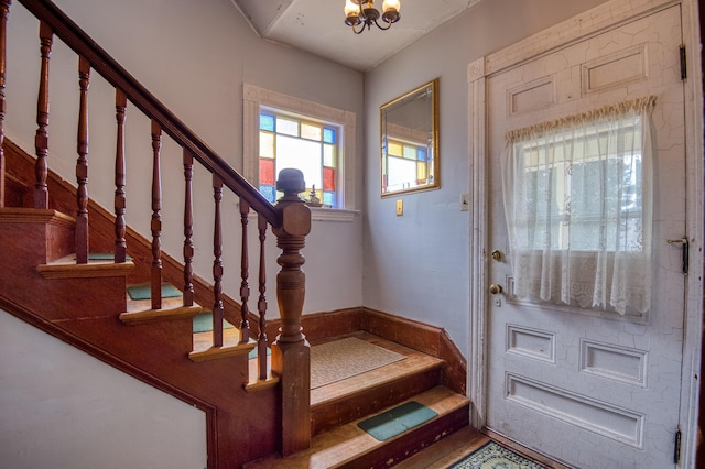 27 Pine St, Eustis, ME 04936 - entryway with stairway and a chandelier
