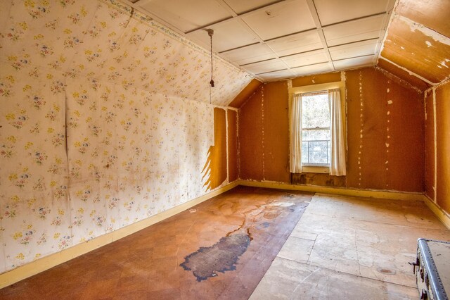 27 Pine St, Eustis, ME 04936 - additional living space featuring baseboards, lofted ceiling, and wallpapered walls