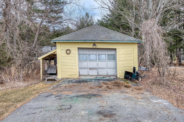 27 Pine St, Eustis, ME 04936 - detached garage featuring driveway