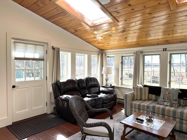 living area with a baseboard heating unit, vaulted ceiling with skylight, a wealth of natural light, and wooden ceiling