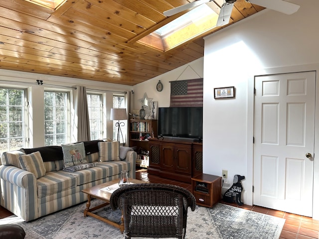 tiled living room with vaulted ceiling with skylight and wooden ceiling