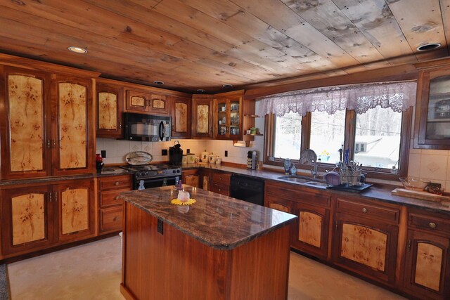 kitchen with glass insert cabinets, black appliances, a kitchen island, wooden ceiling, and a sink
