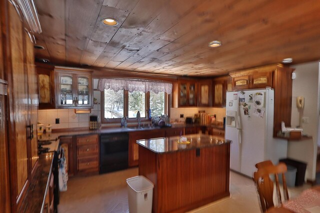 kitchen featuring white fridge with ice dispenser, black dishwasher, dark countertops, wood ceiling, and a sink