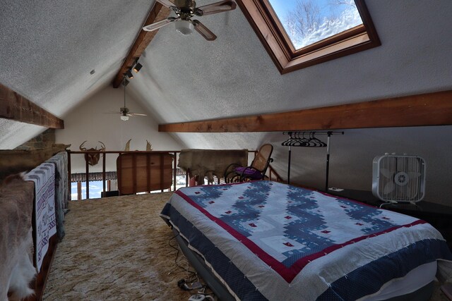 bedroom with a textured ceiling, lofted ceiling with beams, and carpet