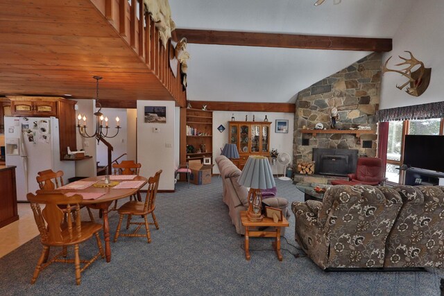 carpeted living room with high vaulted ceiling, an inviting chandelier, and beamed ceiling