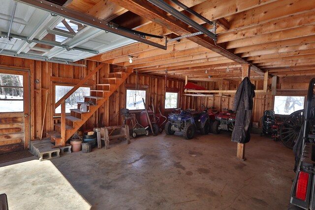 interior space featuring wooden walls