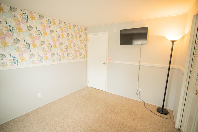 unfurnished bedroom with carpet floors
