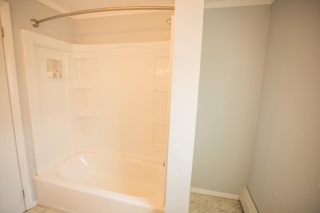 full bathroom featuring washtub / shower combination, baseboards, and baseboard heating