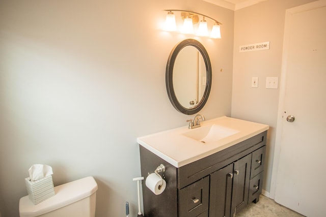 half bath with vanity and toilet