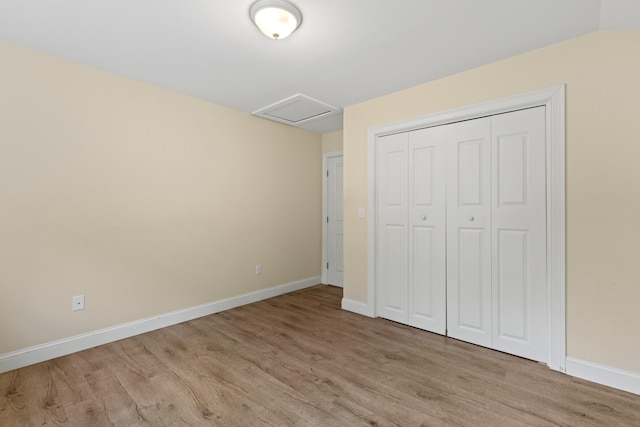 4 Peaceful Way, Windham, ME 04062 - unfurnished bedroom featuring attic access, light wood-type flooring, baseboards, and a closet