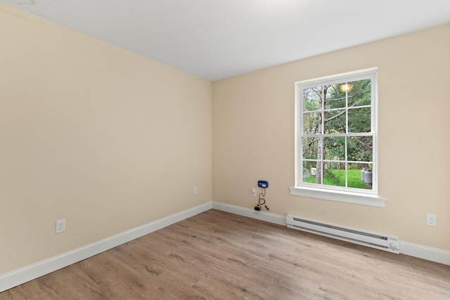4 Peaceful Way, Windham, ME 04062 - spare room with a baseboard heating unit, wood finished floors, and baseboards