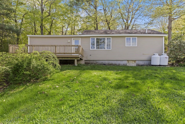 4 Peaceful Way, Windham, ME 04062 - rear view of property featuring a deck and a lawn