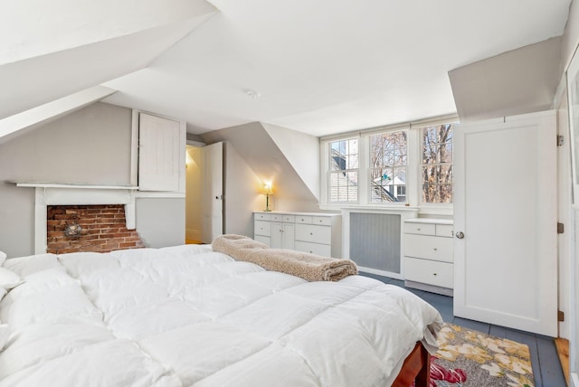 bedroom featuring lofted ceiling
