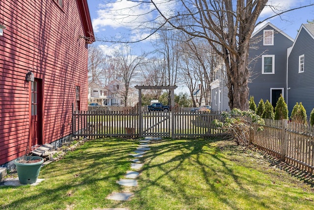view of yard with a residential view and fence private yard