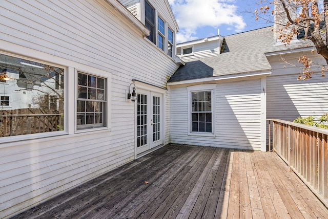 wooden deck featuring french doors