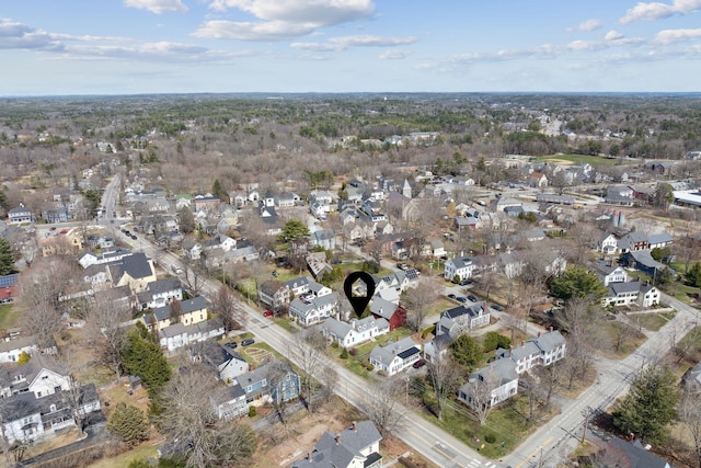 birds eye view of property with a residential view