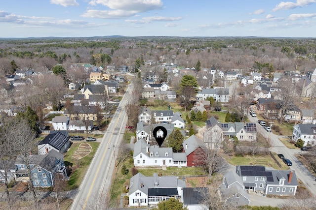 birds eye view of property with a residential view