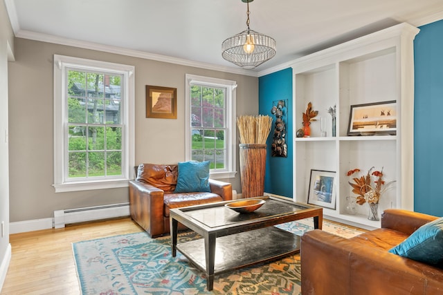 10 Thistleberry Ln, York, ME 03909 - sitting room with a baseboard heating unit, wood finished floors, and crown molding