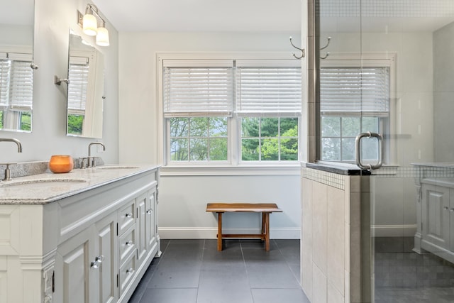 10 Thistleberry Ln, York, ME 03909 - full bath featuring double vanity, a shower with door, and tile patterned flooring