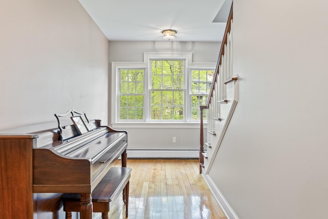 10 Thistleberry Ln, York, ME 03909 - doorway featuring a baseboard heating unit, stairway, and light wood finished floors