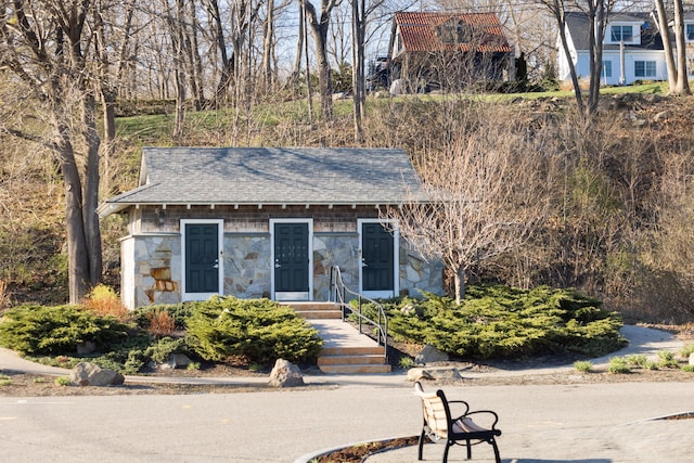 10 Thistleberry Ln, York, ME 03909 - view of front of house featuring stone siding and a shingled roof