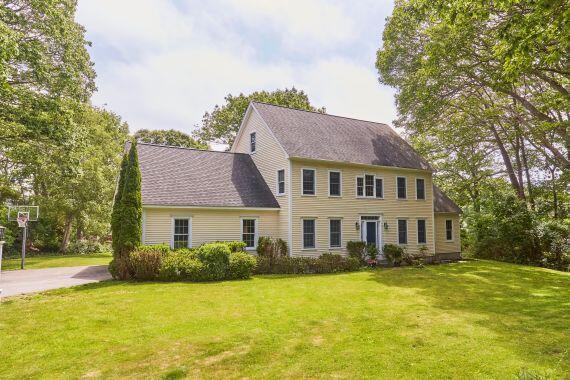 10 Thistleberry Ln, York, ME 03909 - colonial inspired home with a front yard