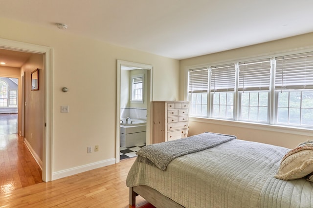 10 Thistleberry Ln, York, ME 03909 - bedroom featuring light wood-type flooring and multiple windows