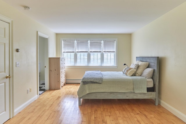 10 Thistleberry Ln, York, ME 03909 - bedroom with light wood finished floors and baseboard heating