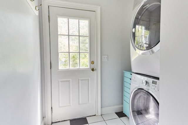 10 Thistleberry Ln, York, ME 03909 - laundry area featuring stacked washer / dryer and light tile patterned floors