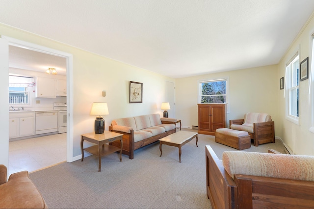 58 Shelton Dr, York, ME 03909 - living room featuring baseboard heating and baseboards