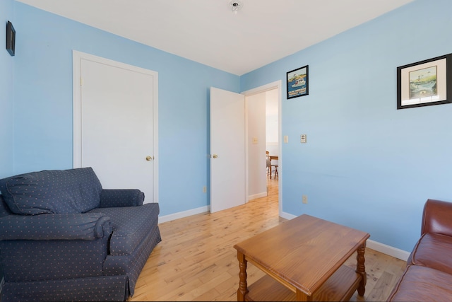 58 Shelton Dr, York, ME 03909 - living area with baseboards and light wood-style flooring
