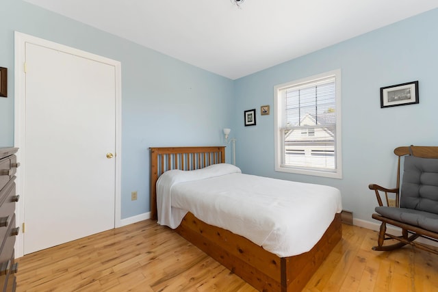 58 Shelton Dr, York, ME 03909 - bedroom with light wood-style flooring and baseboards