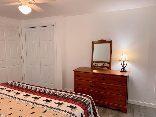 8 Prince St, Lincoln, ME 04457 - bedroom with ceiling fan, a closet, baseboards, and wood finished floors
