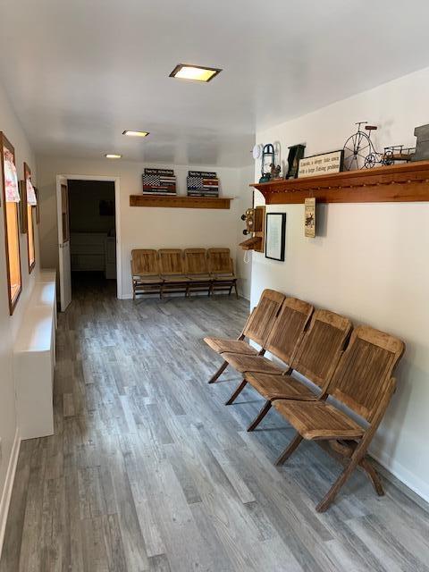 8 Prince St, Lincoln, ME 04457 - living area featuring baseboards and wood finished floors