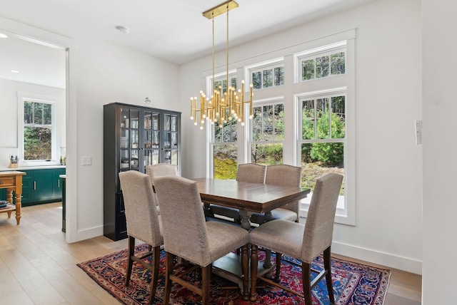 239 Hunter Way, Falmouth, ME 04105 - dining space with a chandelier, light wood-style flooring, baseboards, and recessed lighting