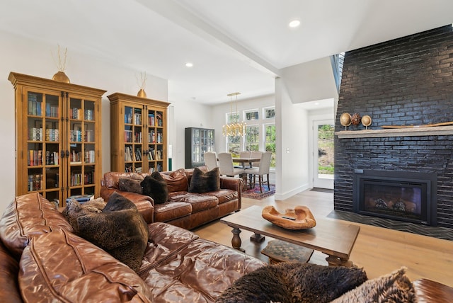 239 Hunter Way, Falmouth, ME 04105 - living area with wood finished floors, recessed lighting, a fireplace, and baseboards