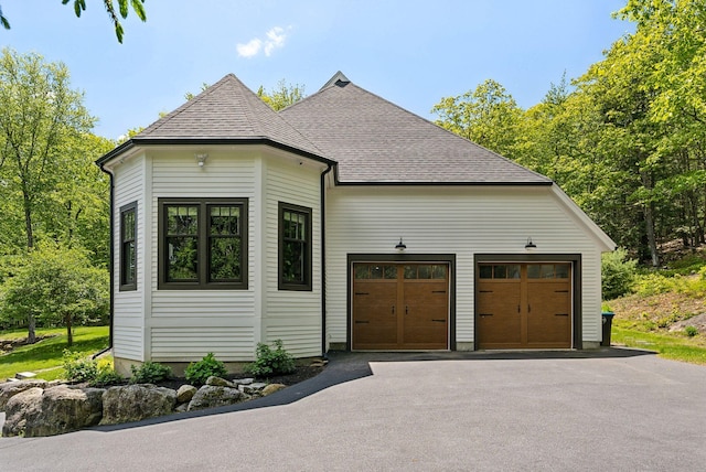 239 Hunter Way, Falmouth, ME 04105 - view of front of property featuring driveway, an attached garage, and roof with shingles