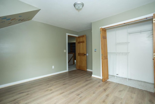 23 Orr St, Wilton, ME 04294 - unfurnished bedroom featuring light wood finished floors and a closet