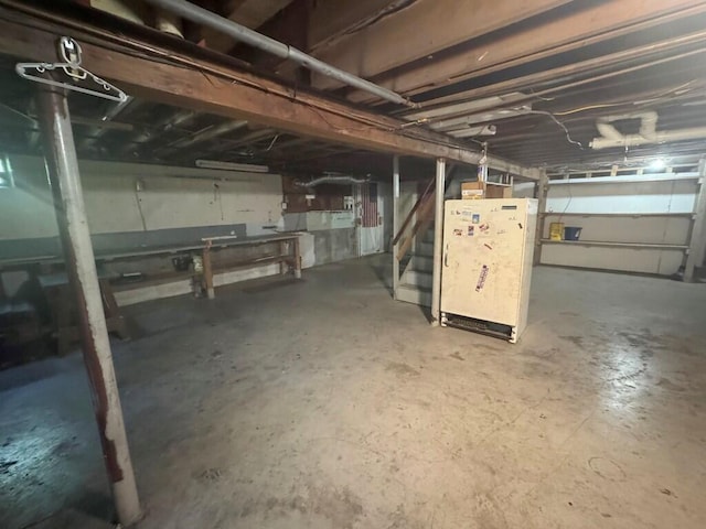23 Orr St, Wilton, ME 04294 - unfinished basement featuring stairs