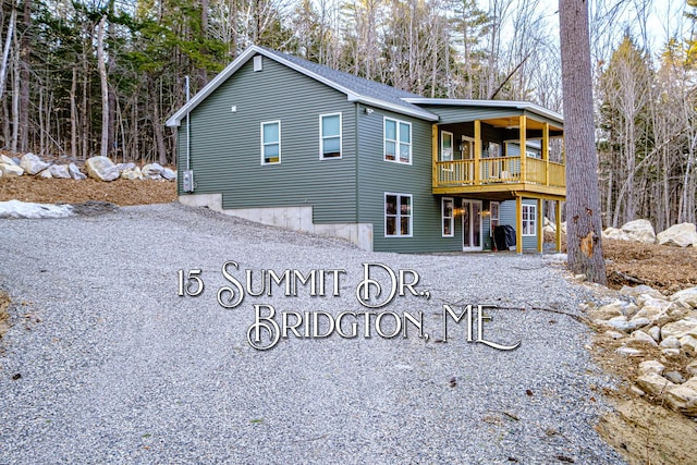 15 Summit Dr, Bridgton, ME 04009 - back of property with a shingled roof