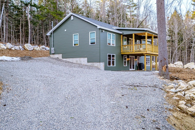 15 Summit Dr, Bridgton, ME 04009 - rear view of house with a shingled roof