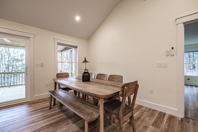 15 Summit Dr, Bridgton, ME 04009 - dining space featuring baseboards, wood finished floors, and vaulted ceiling