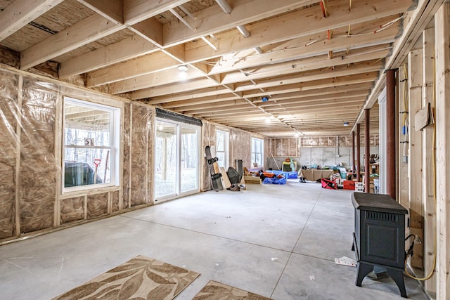 15 Summit Dr, Bridgton, ME 04009 - below grade area with a wood stove