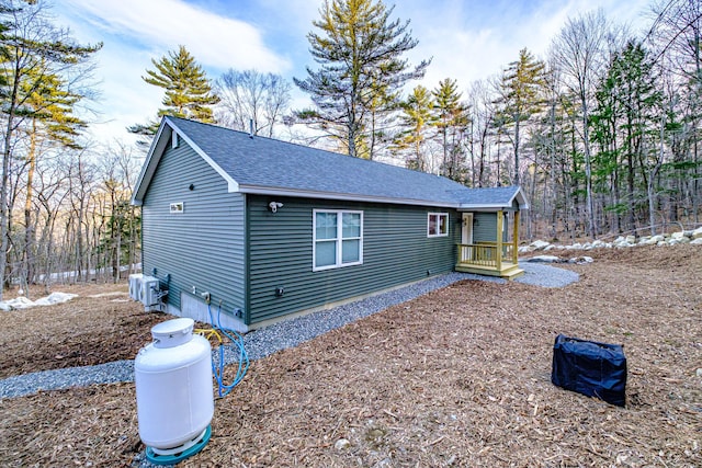15 Summit Dr, Bridgton, ME 04009 - view of side of property featuring a shingled roof