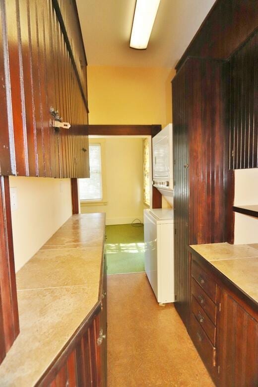 laundry room with washer and dryer and cabinet space