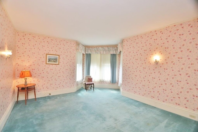 interior space featuring wallpapered walls and carpet flooring