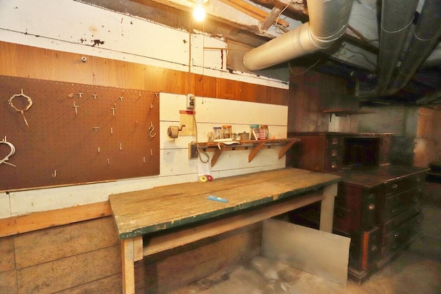 basement with a workshop area